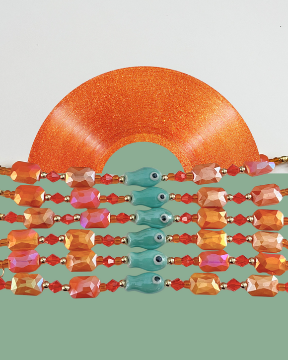 fish bracelets in the colors of Taylor swifts new album the life of a showgirl.