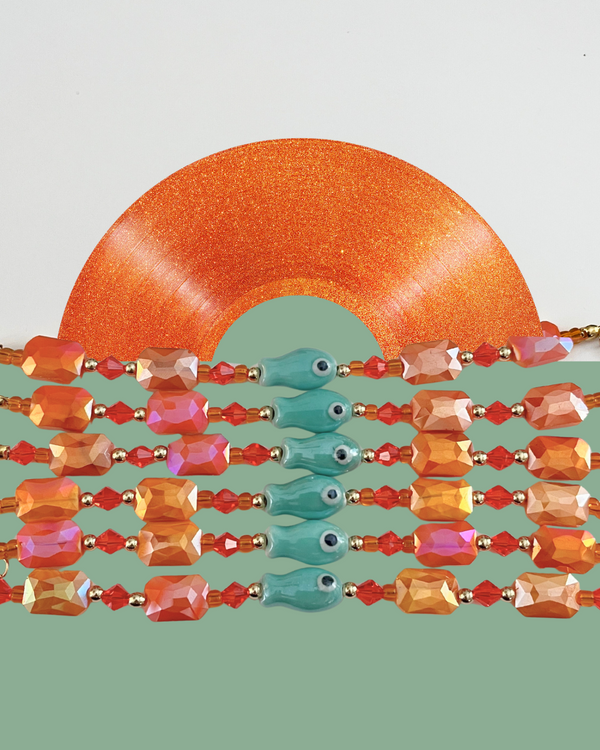 fish bracelets in the colors of Taylor swifts new album the life of a showgirl.