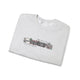Folded gray sweatshirt with a colorful graphic and text on a white background