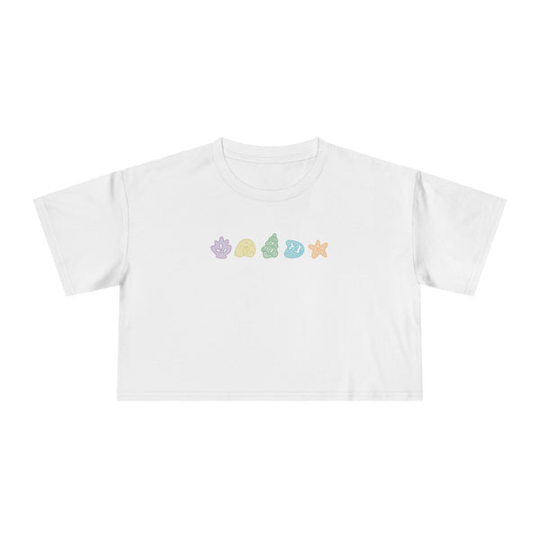 White t-shirt with colorful designs on a white background