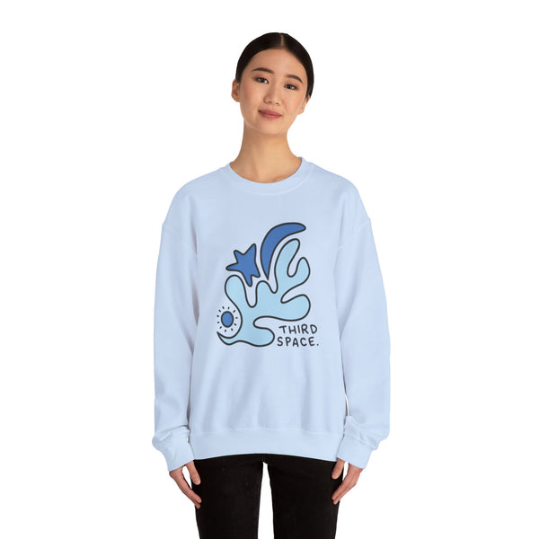 Person wearing a light blue sweatshirt with a graphic design and text on a white background